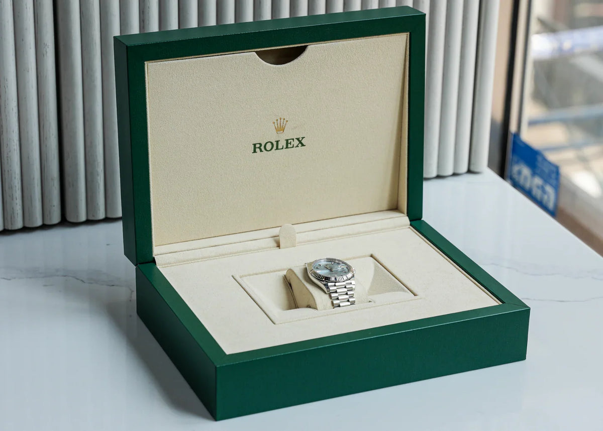 Rolex Day-Date 40mm Platinum President Ice Blue Baguette Dial 228236