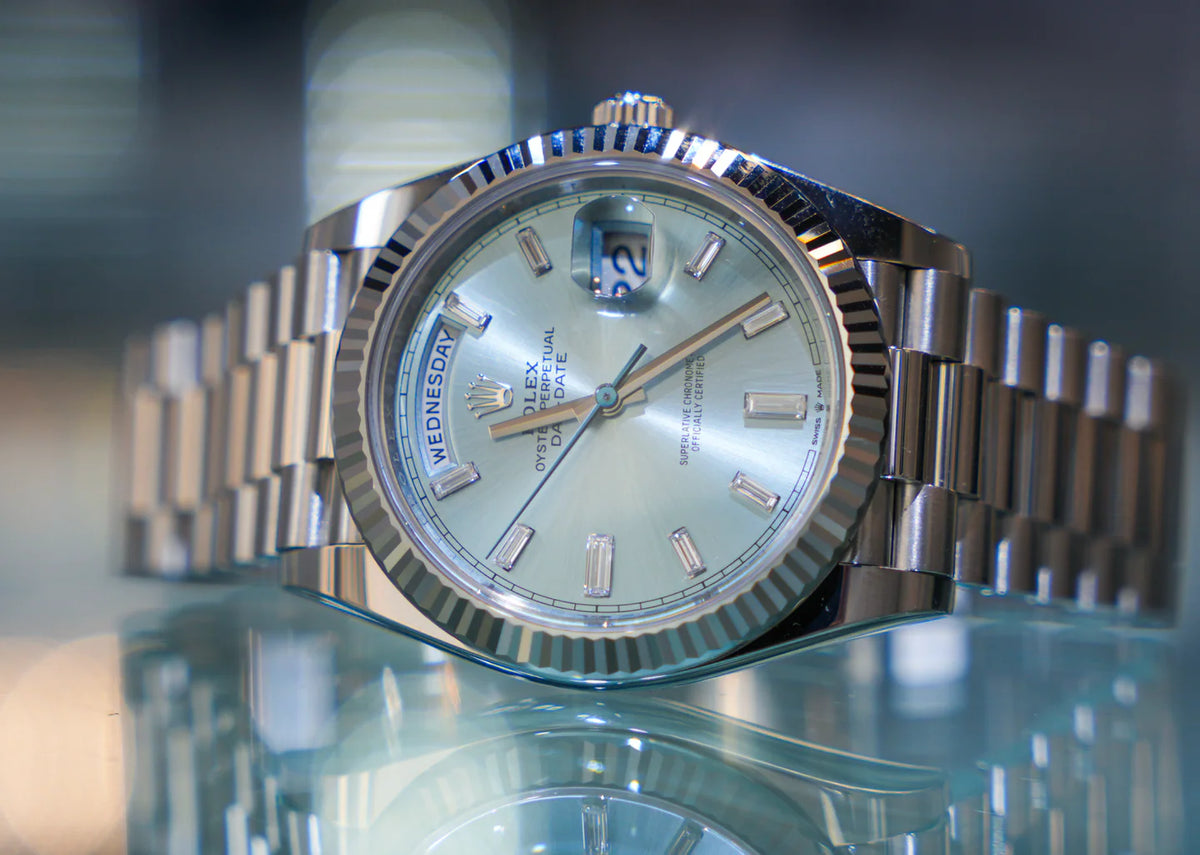 Rolex Day-Date 40mm Platinum President Ice Blue Baguette Dial 228236